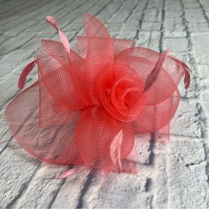 It’s Kentucky Derby season!!  Coral flower fascinator hat like new condition